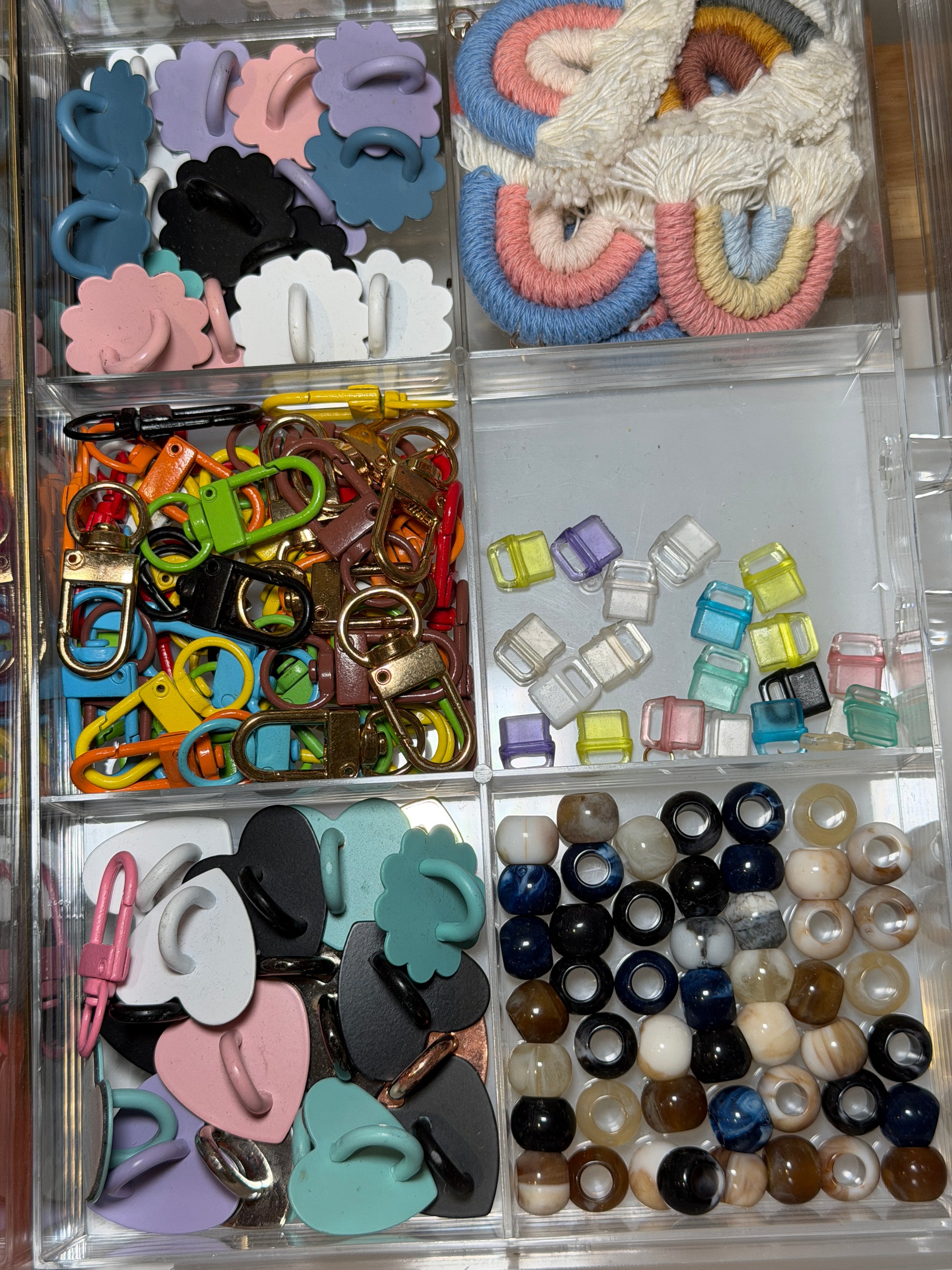 Tray of pastel silicone beads and letter beads