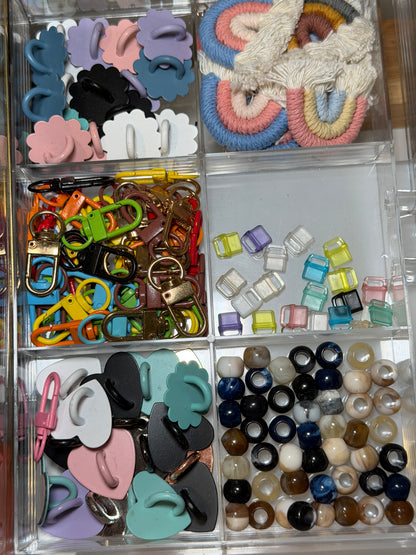Tray of pastel silicone beads and letter beads