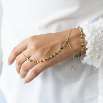 a woman's hand with a beaded bracelet on it Going away gift idea for travelers Waterproof emerald finger bracelet