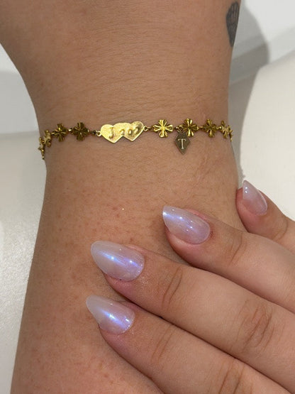 Permanent bracelet with a hand stamped heart charm